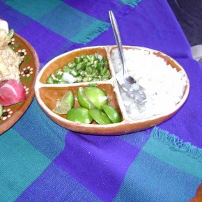 Pozole garnishes: onions, chiles, limes