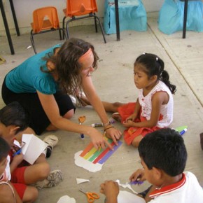 Amy Luckett working with students in the Kindergarten.