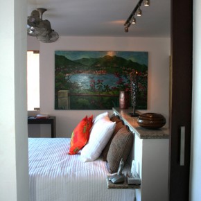 Master Bedroom with painting by local artist, Photo by Marc Pouliot